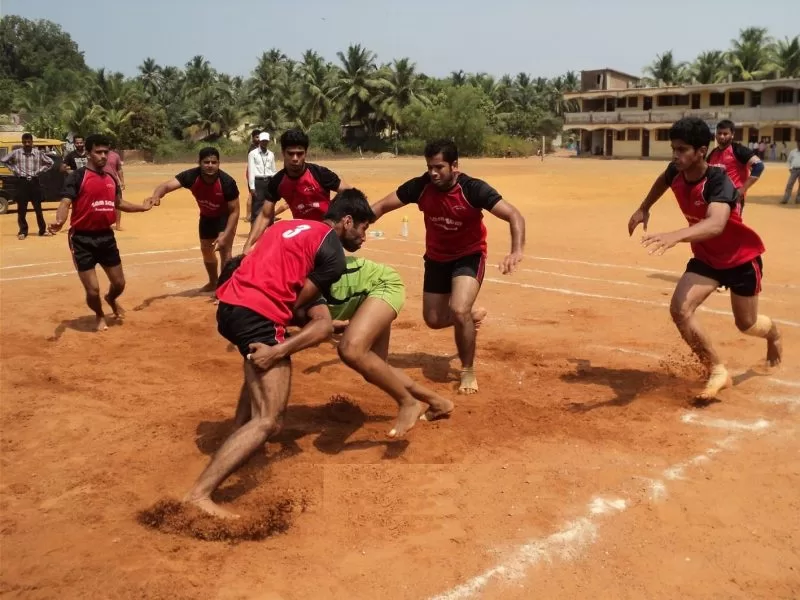A group of boys playing kabbadi