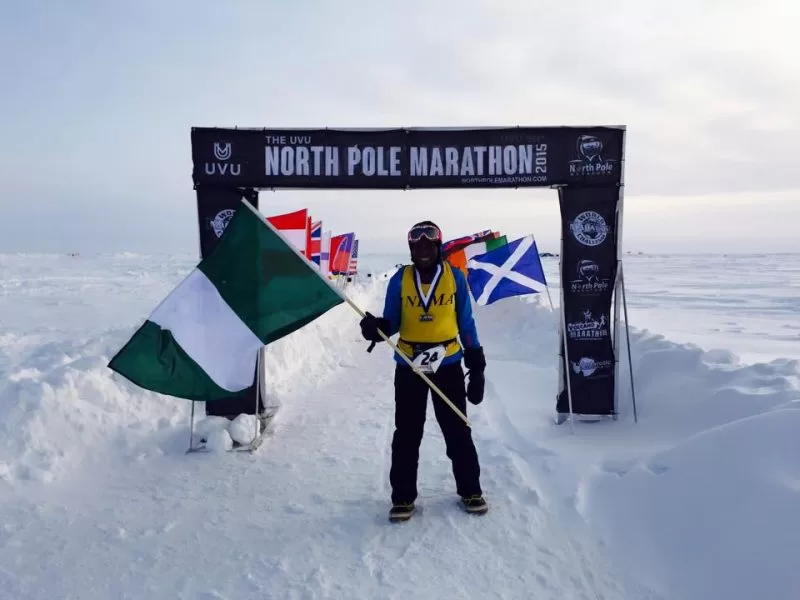 A participant represents his country in a North Pole marathon