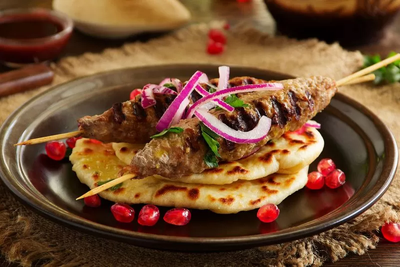 Kebab garnished with onions
