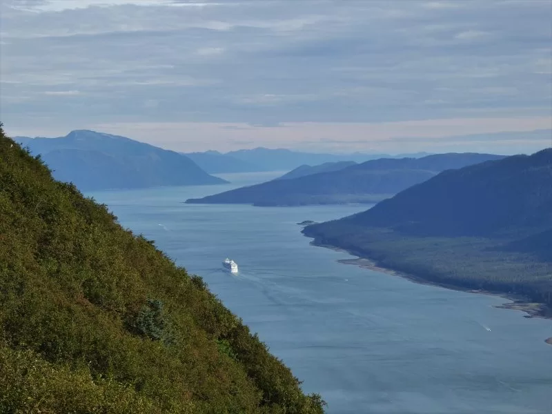 An Alaskan cruise sails off in the distance