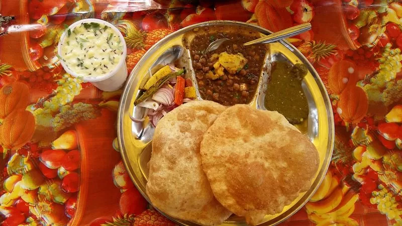 A filling plate of chole bhature