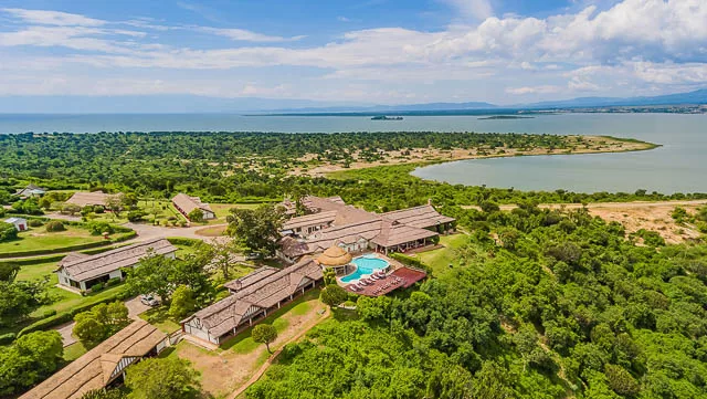 aerial view of kyambura safari lodge and the surrounding forests near queen elizabeth national park, uganda