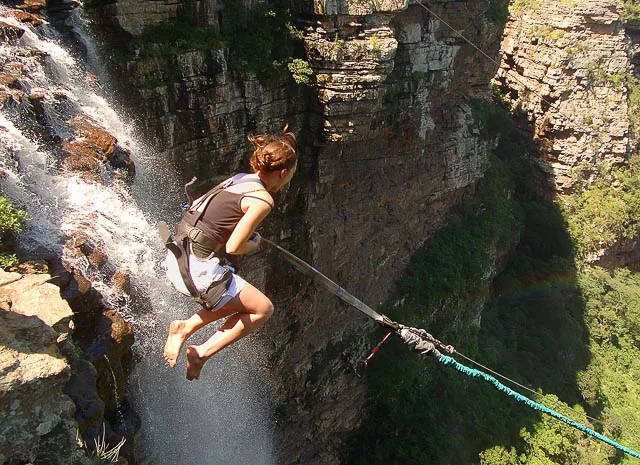 female tourist on gorge swing over victoria falls