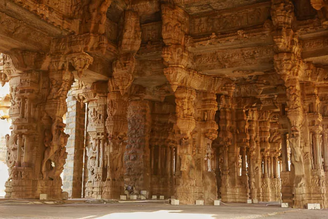 pillars inside of vijaya vittala temple in hampi