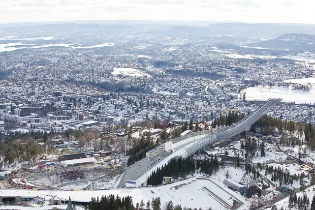 aerial view of snow covered holmenkollbakken ski jump hill in oslo, norway