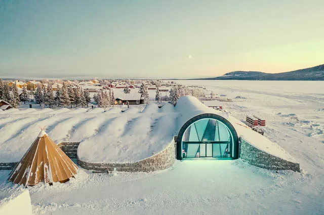 transparent gate in fully snow covered icehotel in jukkasjärvi, sweden