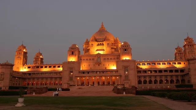 lights lit up at dusk in umaid bhawan palace in jodhpur, rajasthan