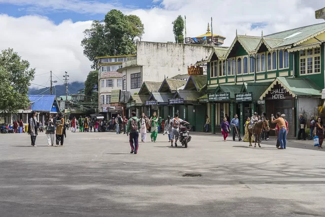 people on the busy streets of darjeeling west bengal india
