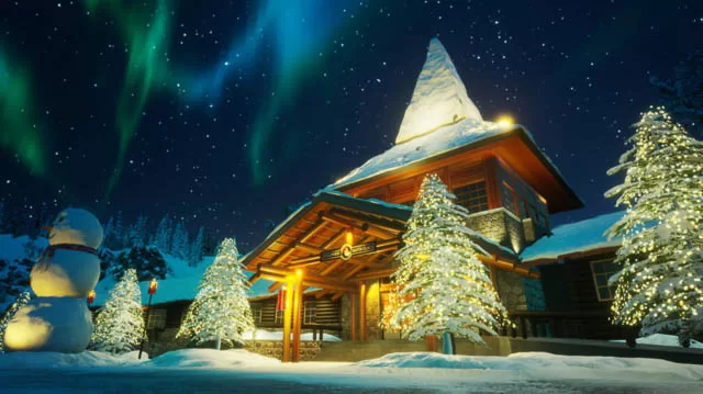 polar lights dancing above santa office at santa claus village in rovaniemi finland
