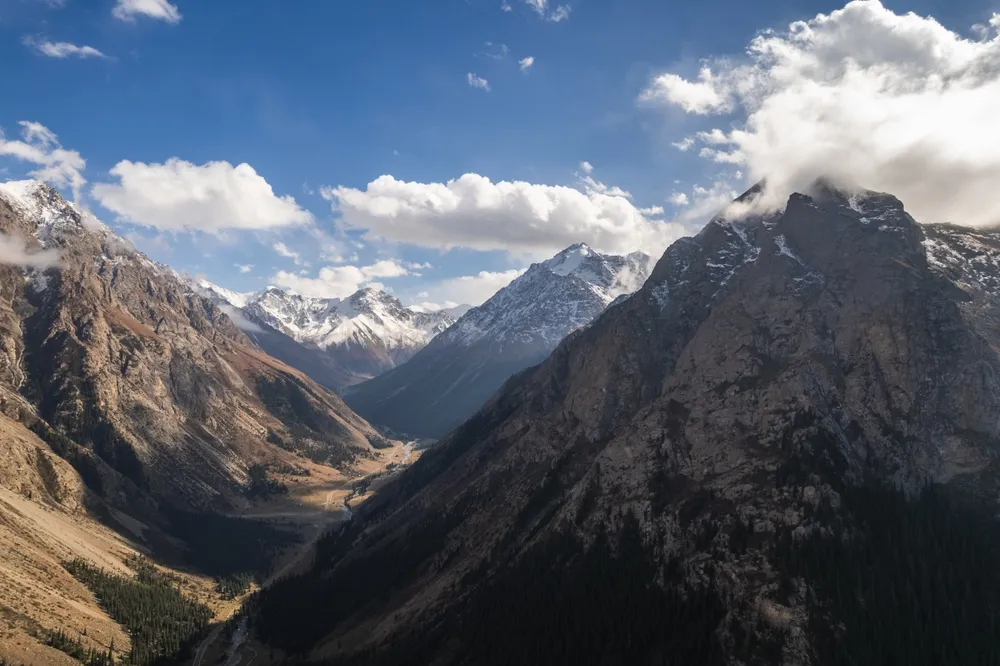 Altai Mountains — snow leopards & eagle hunters.