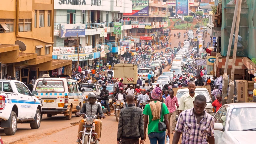 Kampala's hills and rooftops under an afternoon sky.