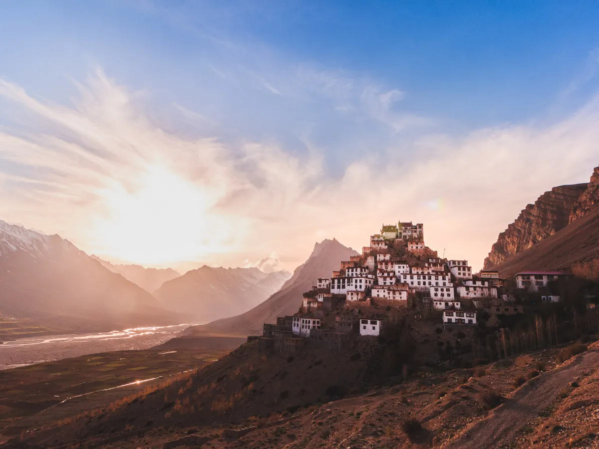 The Spiti valley under snow, a monastery on a bluff above the river.