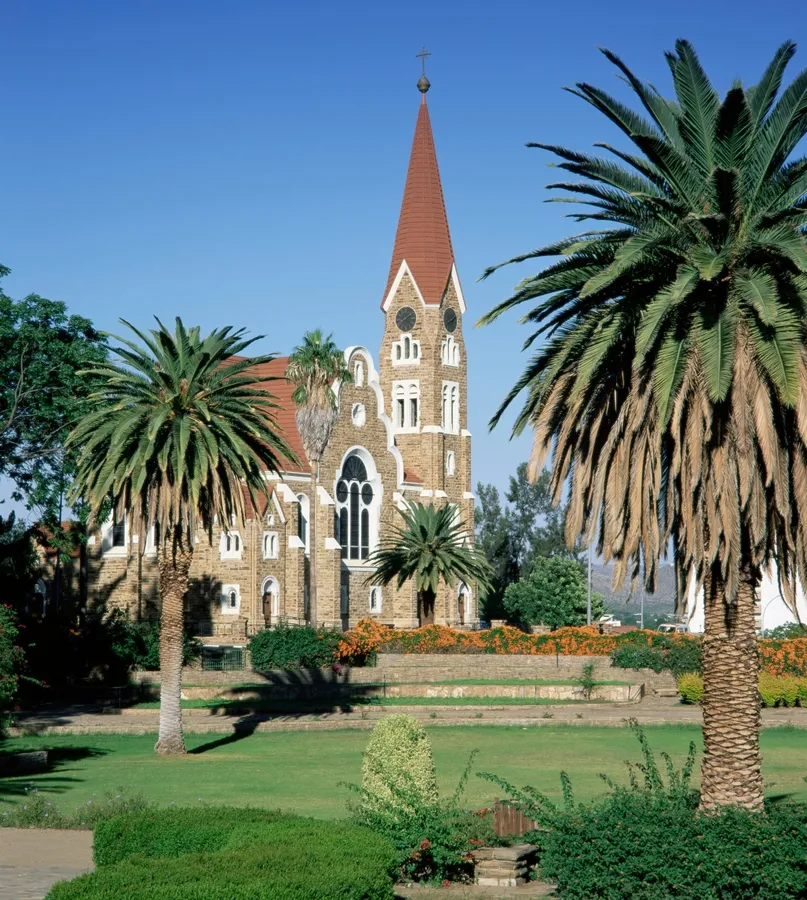 Windhoek's church and colonial buildings against the highland hills.