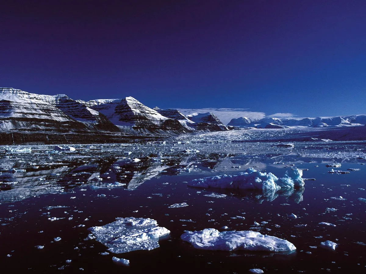 Icebergs and mountains in Scoresby Sund, East Greenland.